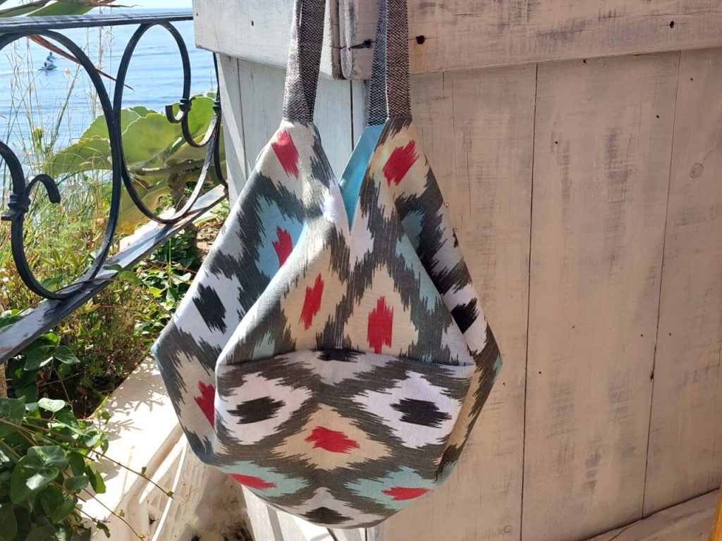 Bolso origami Ikat turquesa